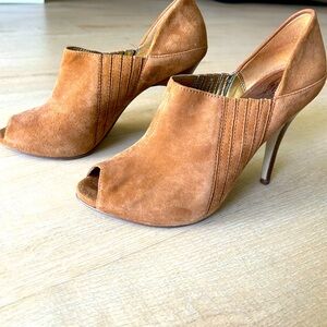 Women’s rust faux suede high heel bootie with peep toe.  Size 7